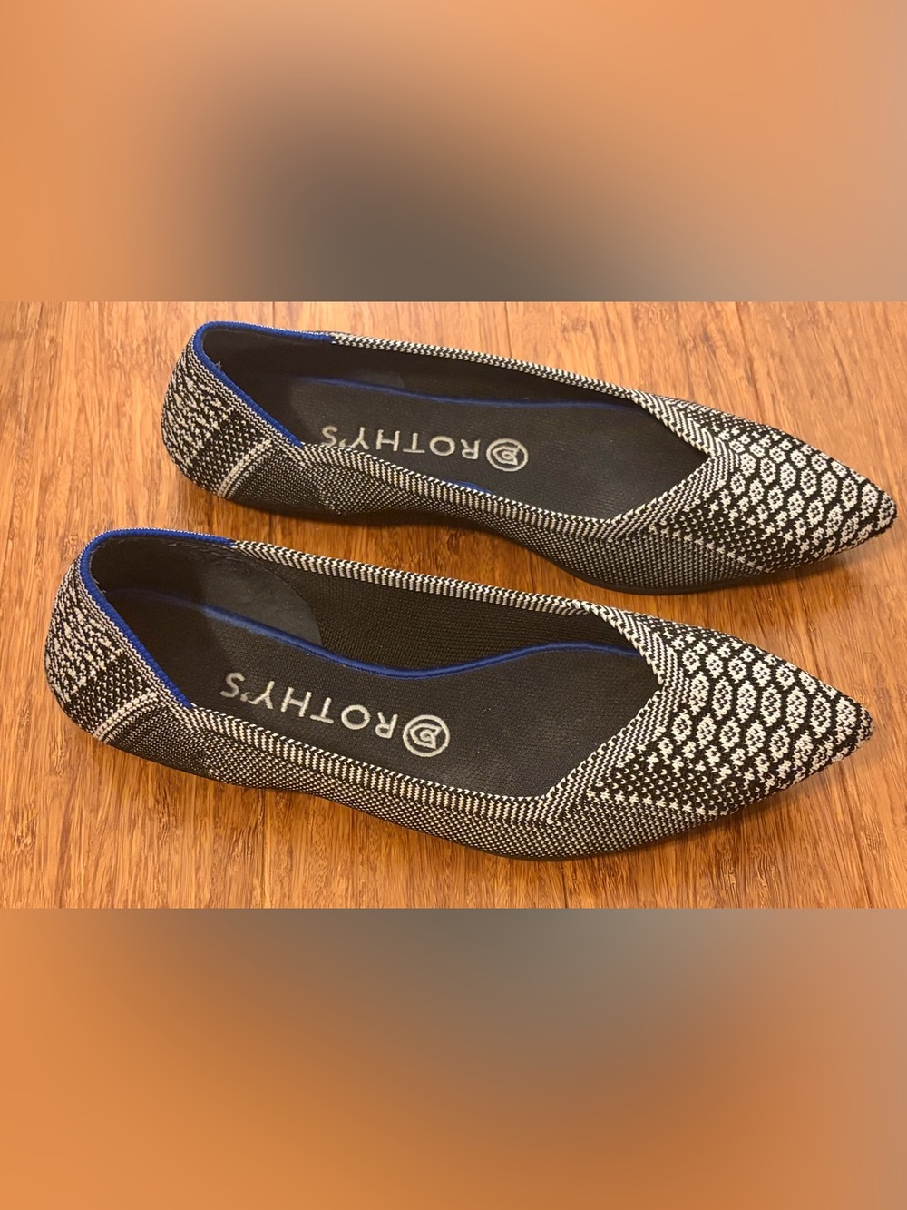 Rothy's Black & White Pointed Knit Flats with Cool Snake Print